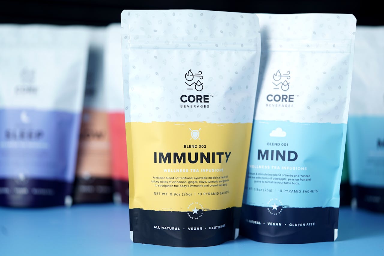 Vibrant packaging of wellness tea blends highlighted with focus on immunity and mind infusions.